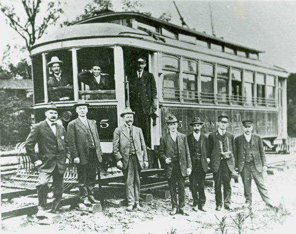 Toronto Suburban Railway Trolley Car with conductor and passengers in Woodbridge, ca. 1900